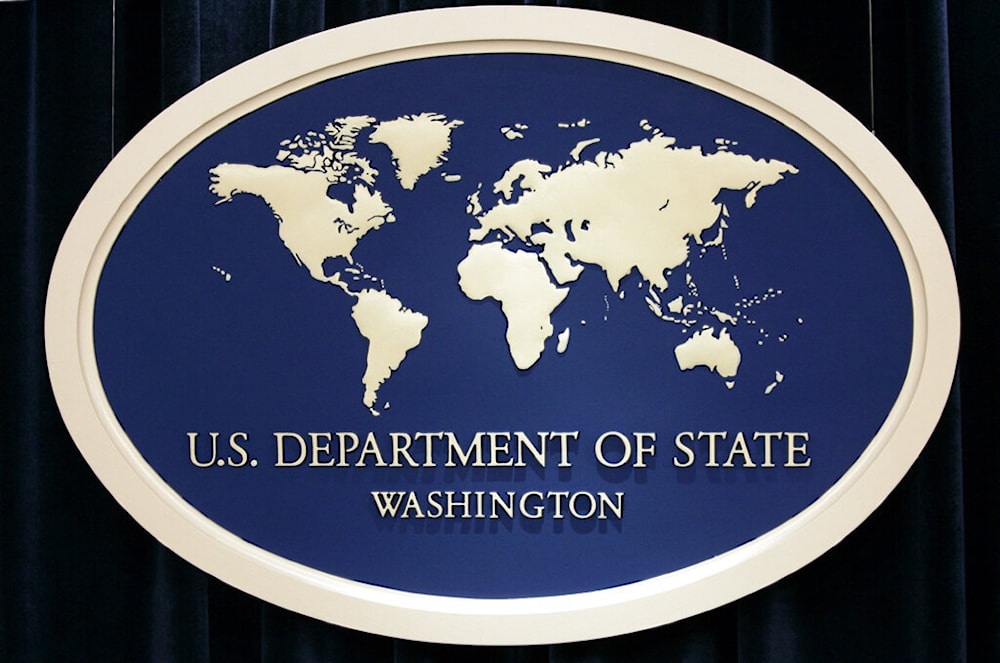 The sign used as the backdrop for press briefings at the U.S. Department of State, Aug. 10, 2006 (AP)