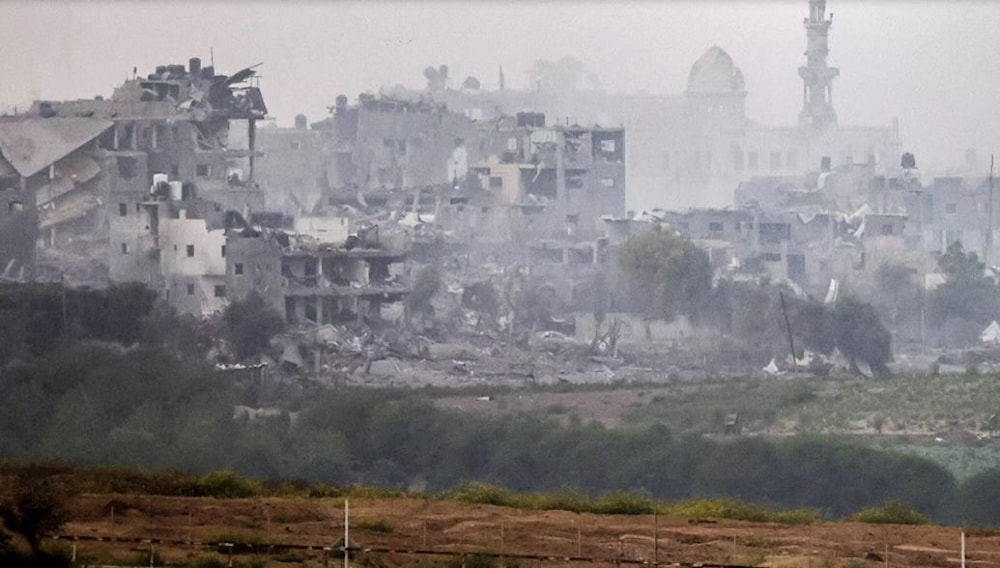 Bombed-out buildings seen inside the Gaza Strip (AFP)