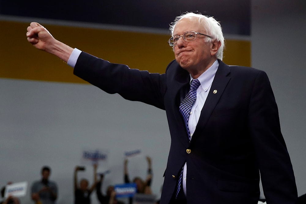 Democratic presidential candidate Sen. Bernie Sanders, Independent-Vermont., arrives to speak to supporters at a primary night election rally in Manchester, New Hampshire, February 11, 2020. (AP)