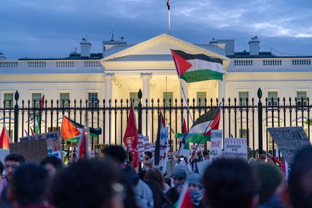 Anti-war activists protest outside of the White House during a pro-Palestinian demonstration asking for a cease-fire in Gaza in Washington, November 4, 2023 (AP)