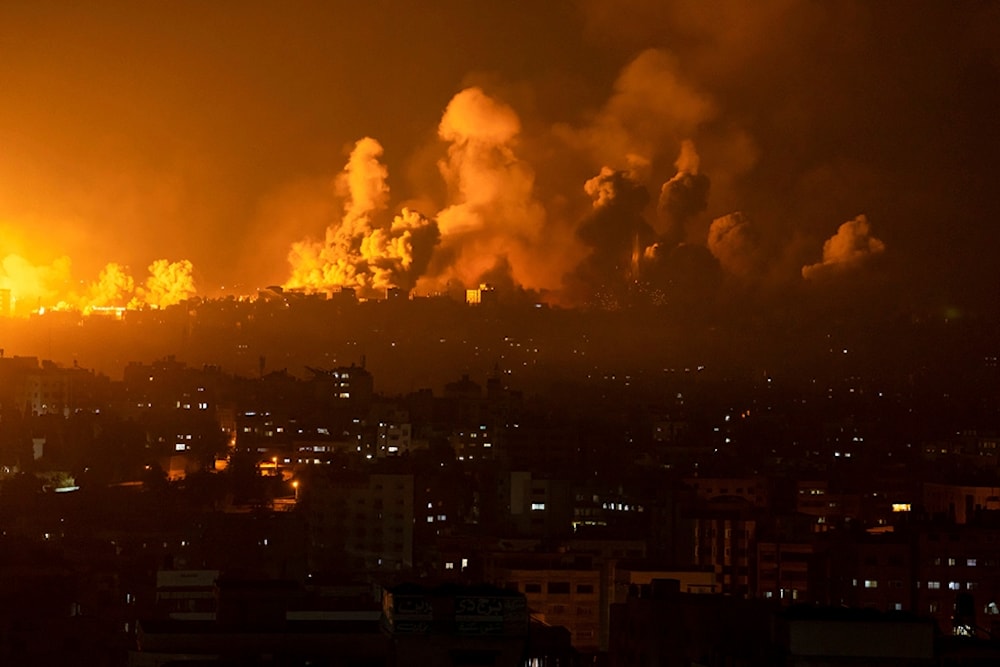 Fire and smoke rise following an Israeli occupation airstrike on Gaza City, occupied Palestine, Sunday, Oct. 8, 2023. (AP)