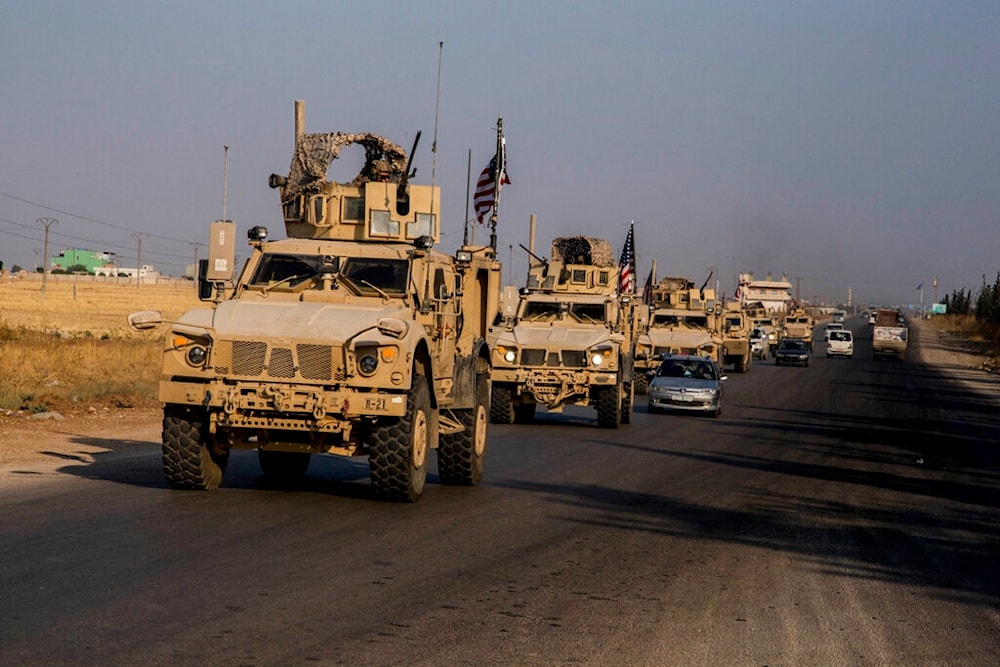 US military convoy drives near the town of Qamishli, north Syria, Saturday, Oct. 26. 2019. (AP)