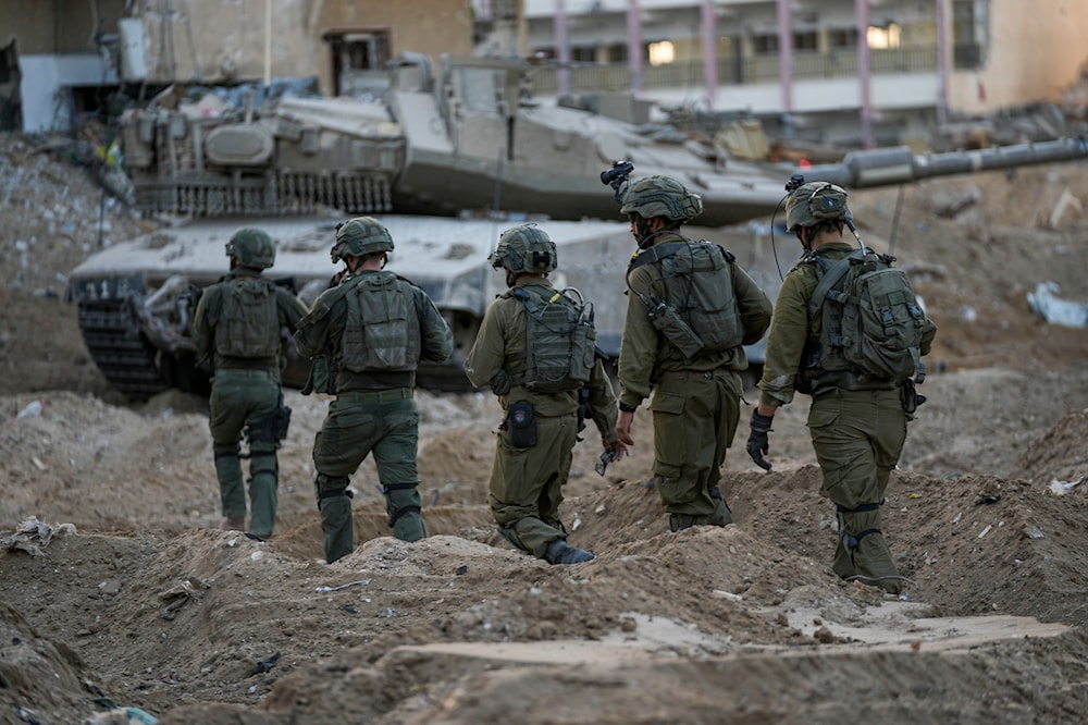 Israeli IOF troops are seen during a ground operation in the Gaza Strip, Wednesday, Nov. 8, 2023. (AP)