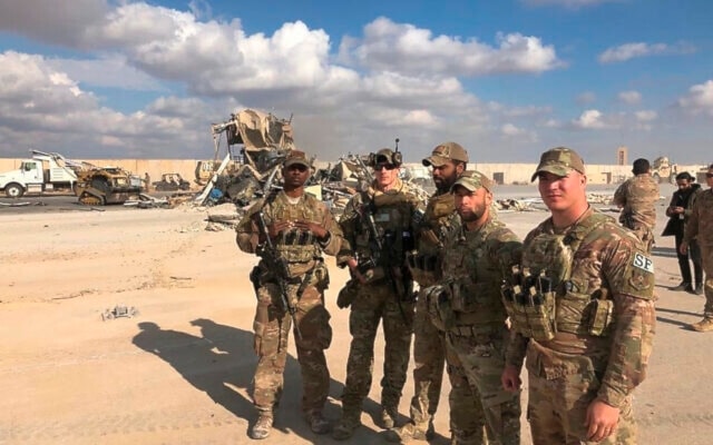 US occupation soldiers stand at Ain al-Assad air base in Anbar, Iraq, Monday, Jan. 13, 2020. (AP)