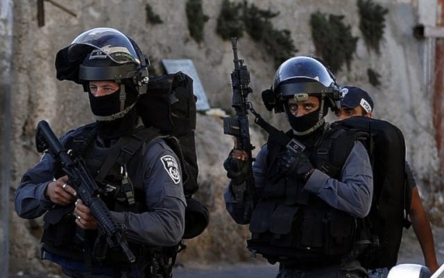 Illustrative photo of Israeli occupation Police officers (AFP)