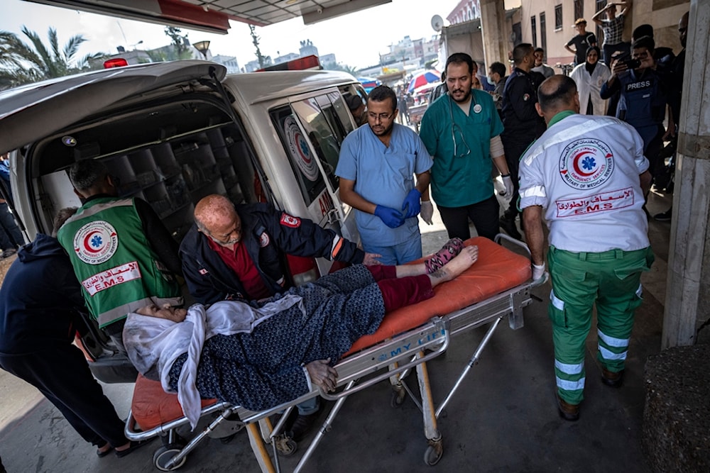 Palestinians wounded in Israeli bombardment of the Gaza Strip are brought to a hospital in Khan Younis, Friday, Dec. 1, 2023. (AP Photo/Fatima Shbair)