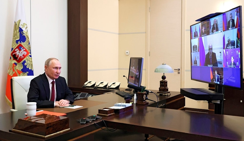 Russian President Vladimir Putin chairs a Security Council meeting via videoconference at the Novo-Ogaryovo state residence outside Moscow, on Friday, Dec. 1, 2023. (Mikhail Klimentyev, Sputnik, Kremlin Pool Photo via AP)