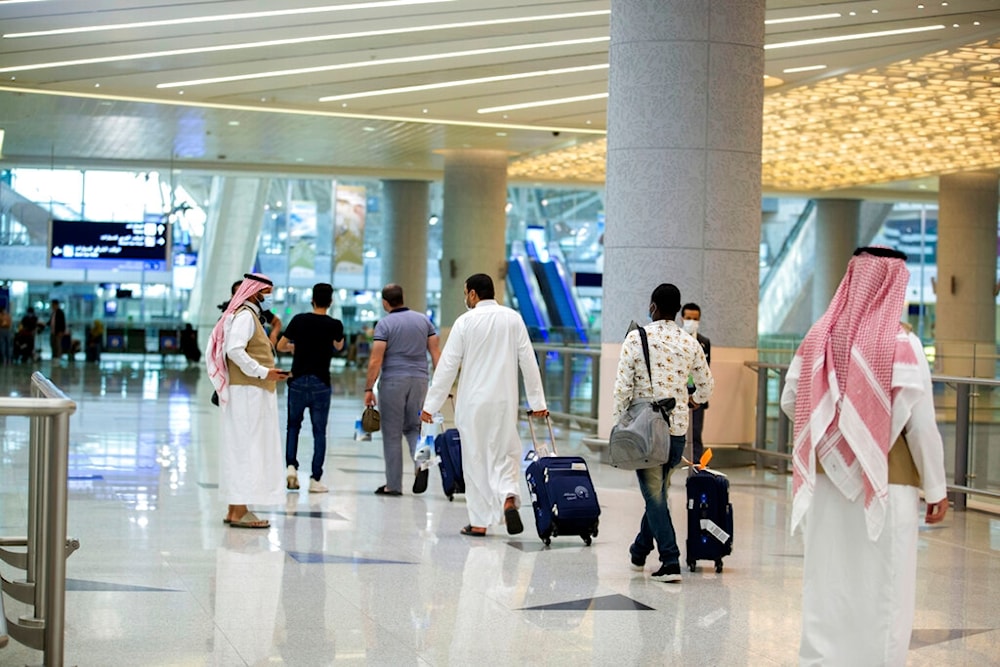 Pilgrims arrive to King Abdulaziz Airport for the Hajj pilgrimage to Mecca, in Jeddah, Saudi Arabia, Saturday, July 25, 2020 (Saudi Ministry of Media via AP)