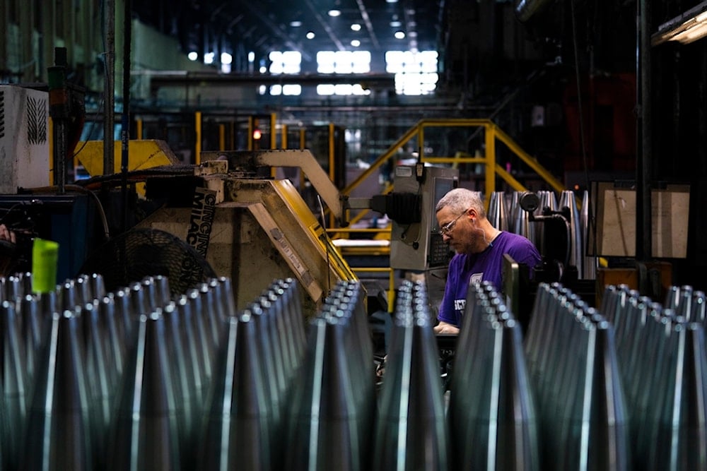 A steel worker manufactures 155 mm M795 artillery projectiles at the Scranton Army Ammunition Plant in Scranton, Pa., Thursday, April 13, 2023 (AP Photo/Matt Rourke)