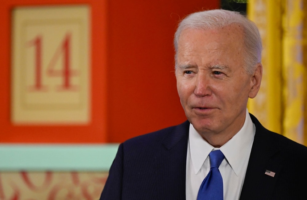 President Joe Biden speaks at a Hanukkah reception in the East Room of the White House in Washington, Monday, Dec. 11, 2023. (Andrew Caballero-Reynolds, Pool via AP)