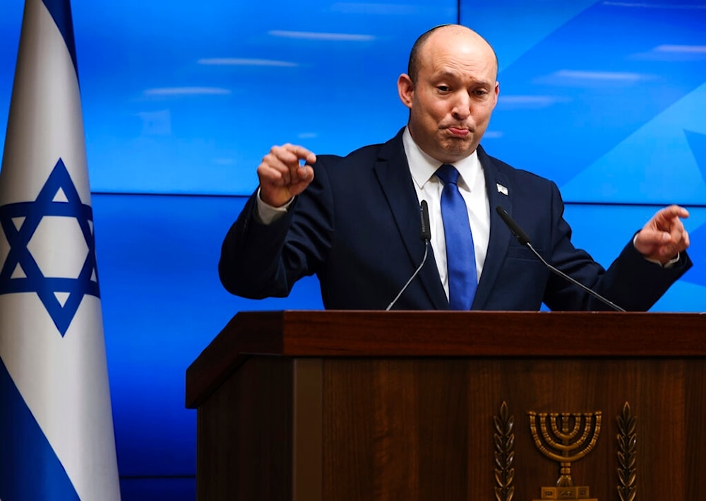 Israeli Prime Minister Naftali Bennett speaks during a press conference on economic issues, in occupied al-Quds, Tuesday, July 6, 2021 (AP)