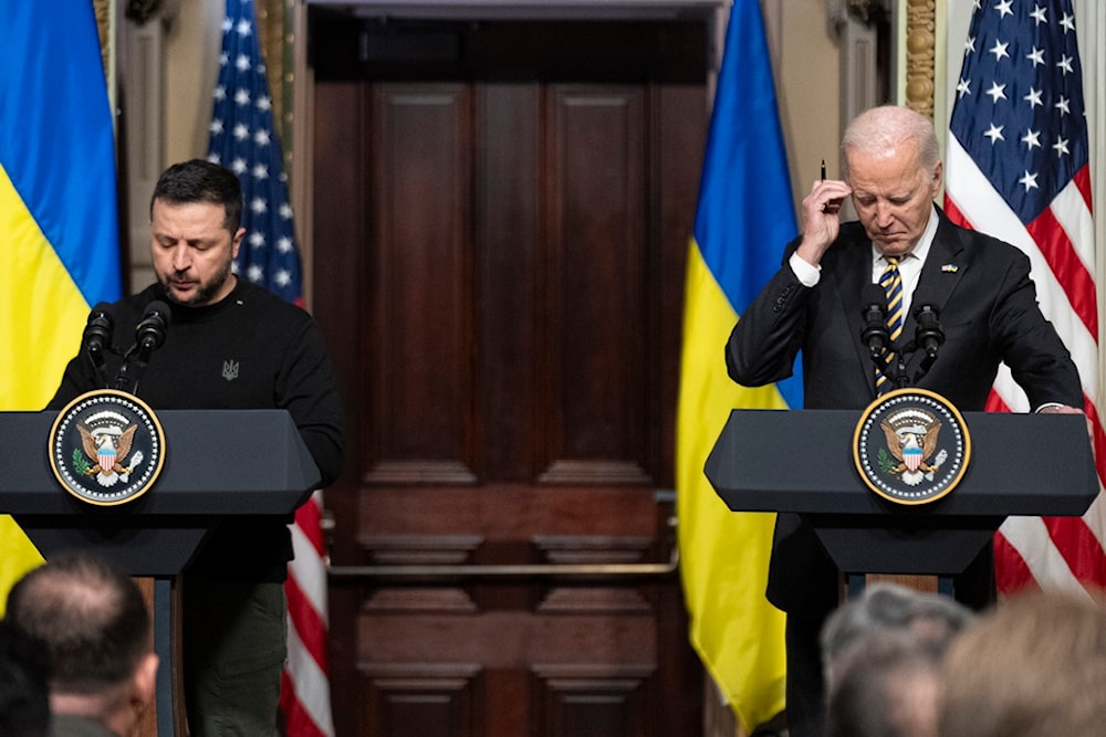 President Joe Biden and Ukrainian President Volodymyr Zelenskyy attend a news conference in the Indian Treaty Room in the Eisenhower Executive Office Building on the White House Campus, Tuesday, Dec. 12, 2023, in Washington. (AP)