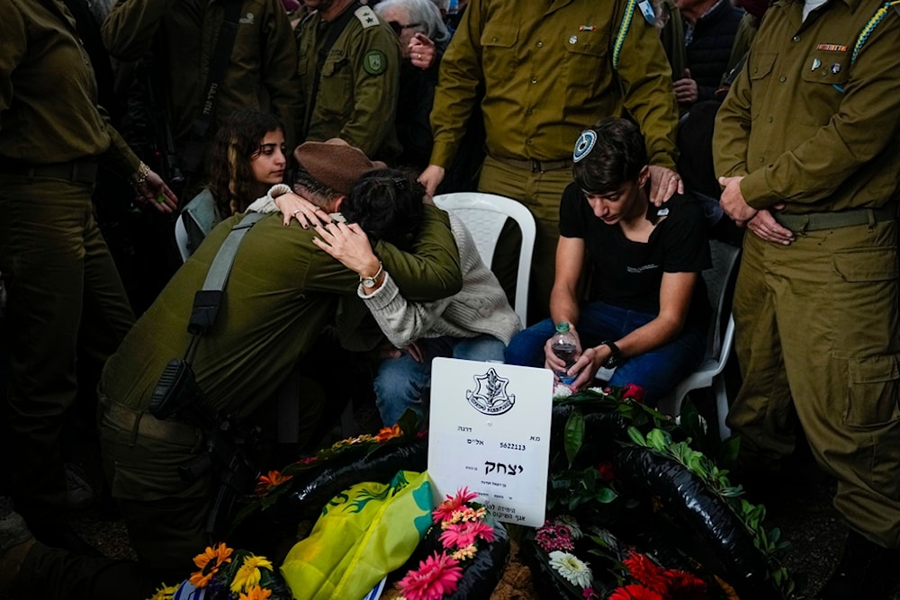 Israeli soldiers during attend the funeral of an Israeli soldier in Kfar Tavor', occupied Palestine, December 13, 2023'. (AP)