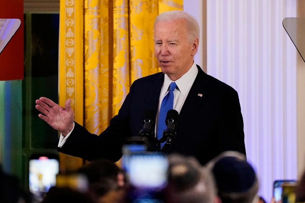 President Joe Biden speaks during a Hanukkah reception in the East Room of the White House in Washington, Monday, Dec. 11, 2023 (AP)
