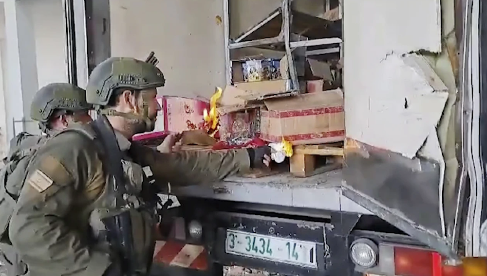 Videos show Israeli soldiers in Gaza burning food, vandalizing a shop and  ransacking private homes