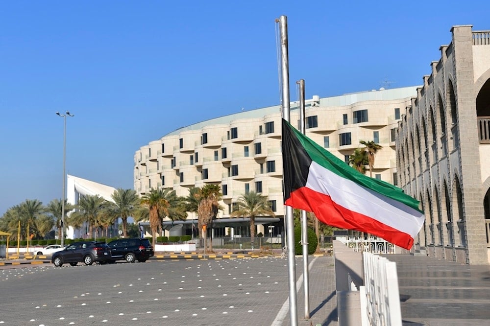 Kuwait national flag is in half mast after the death of the Emir of Kuwait Sheikh Nawaf Al Ahmad Al Sabah, in Kuwait, Saturday, Dec. 16, 2023. (AP)