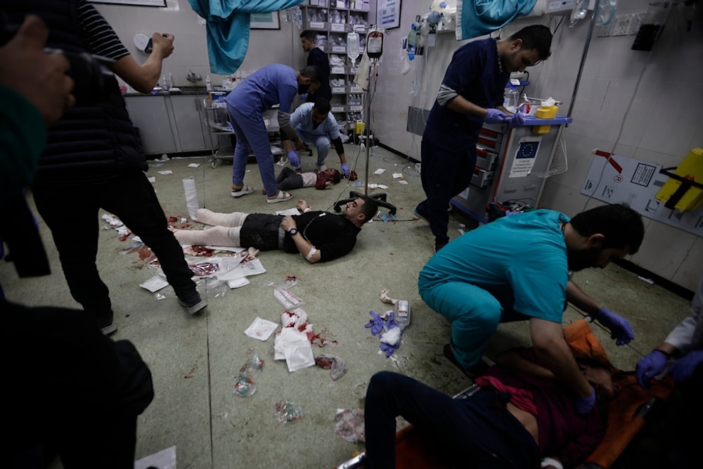 Palestinians wounded in the Israeli bombardment of the Gaza Strip arrive at a hospital in Khan Younis on Friday, Dec. 8, 2023. (AP)