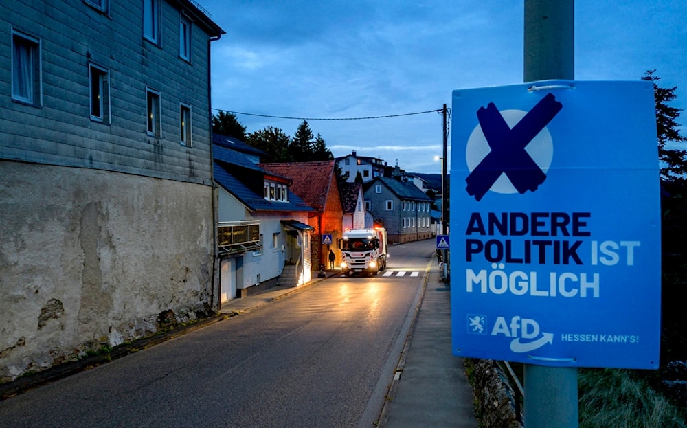 An elections poster of German right wing party AfD is fixed at a pole in Oberreifenberg near Frankfurt, Germany, Monday, Oct. 9, 2023. (AP)