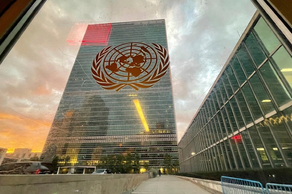 The United Nations headquarters building is seen from inside the General Assembly hall, on Sept. 21, 2021 (AP)