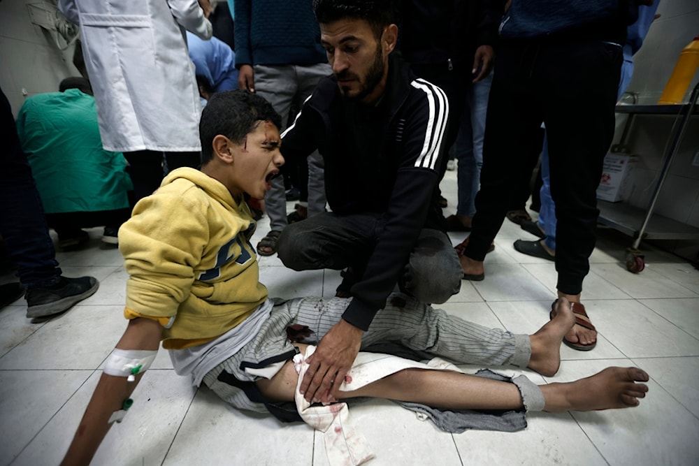 A Palestinian boy wounded in Israeli airstrikes on a U.N.-run school receives treatment at the Nasser hospital in the town of Khan Younis, southern Gaza Strip. Saturday, Dec. 17, 2023. (AP)
