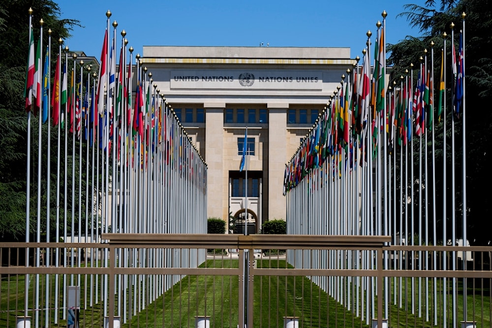 Flagpoles line in rows in front of a building of the United Nations in Geneva, Switzerland on June 14, 2021 (AP)