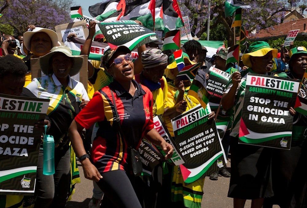  Pro-Palestinian supporters demonstrate at the entrance to the Israeli embassy in Pretoria, South Africa, on Oct. 20, 2023 (AP)