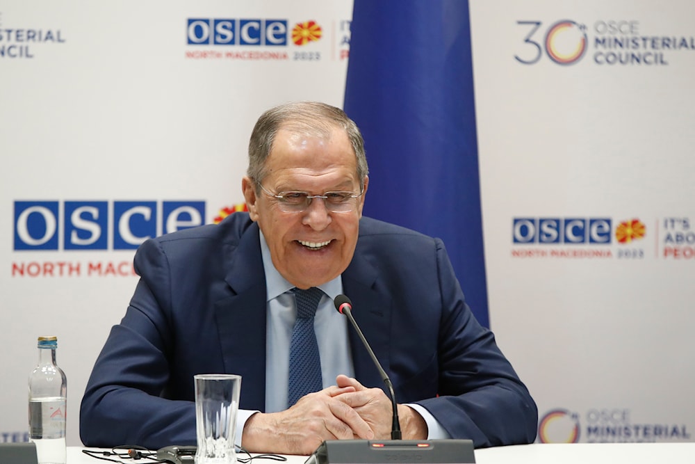 Russia's Foreign Minister Sergey Lavrov is laughing during his news conference at the time of the OSCE meeting in Skopje, North Macedonia, on Friday, Dec. 1, 2023. (AP)