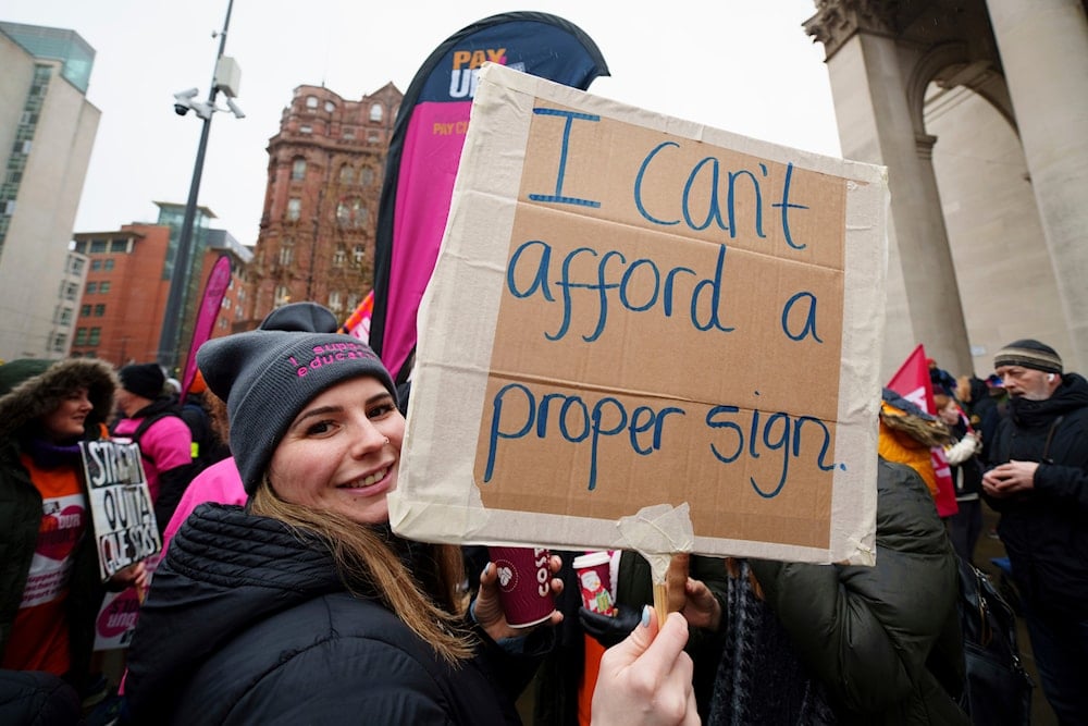 A demonstration in support of strikers is seen in central Manchester, England, Wednesday, Feb. 1, 2023. (AP)