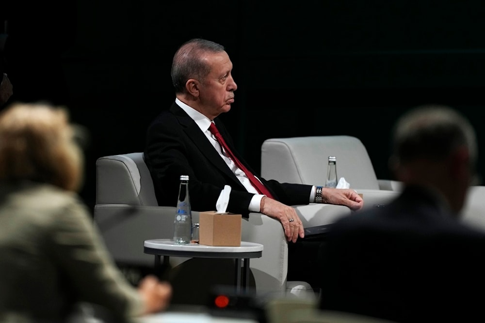 Turkey President Recep Tayyip Erdogan waits to speak in a plenary session at the COP28 U.N. Climate Summit, Friday, Dec. 1, 2023, in Dubai, United Arab Emirates. (AP )