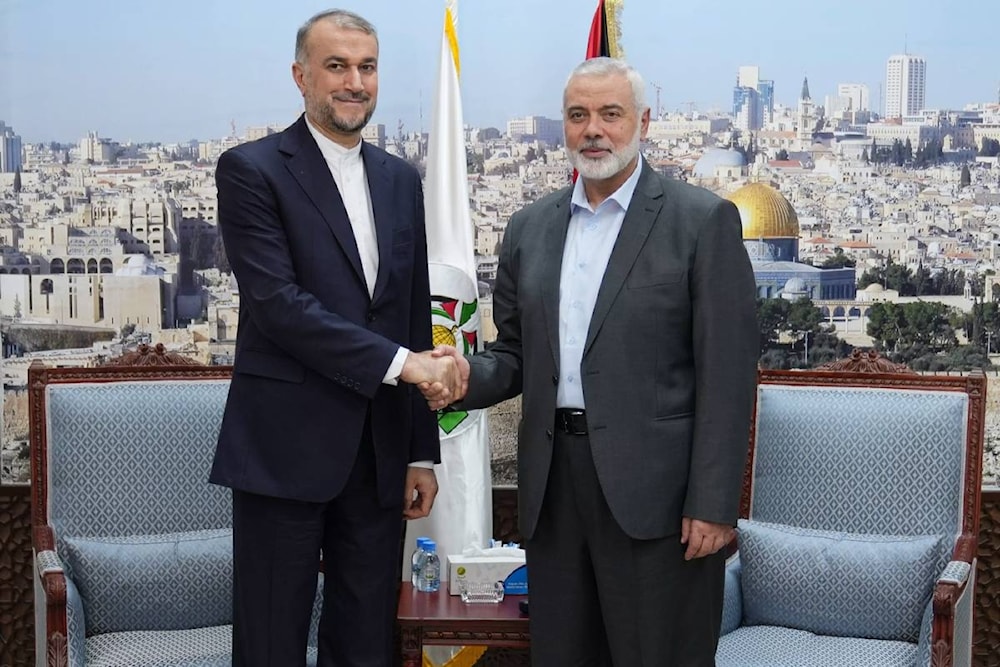 Iranian Foreign Minister Hossein Amir-Abdollahian meets with Hamas Political Bureau Chairman Ismail Haniyeh in Doha, Qatar on November 24, 2023. (Iranian Foreign Ministry / Handout)