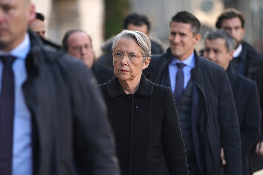 French Prime Minister Elisabeth Borne arrives to the funeral ceremony for former Lyon mayor Gerard Collomb, Wednesday, Nov. 29, 2023 at the Saint-Jean cathedral in Lyon, central France. (AP)