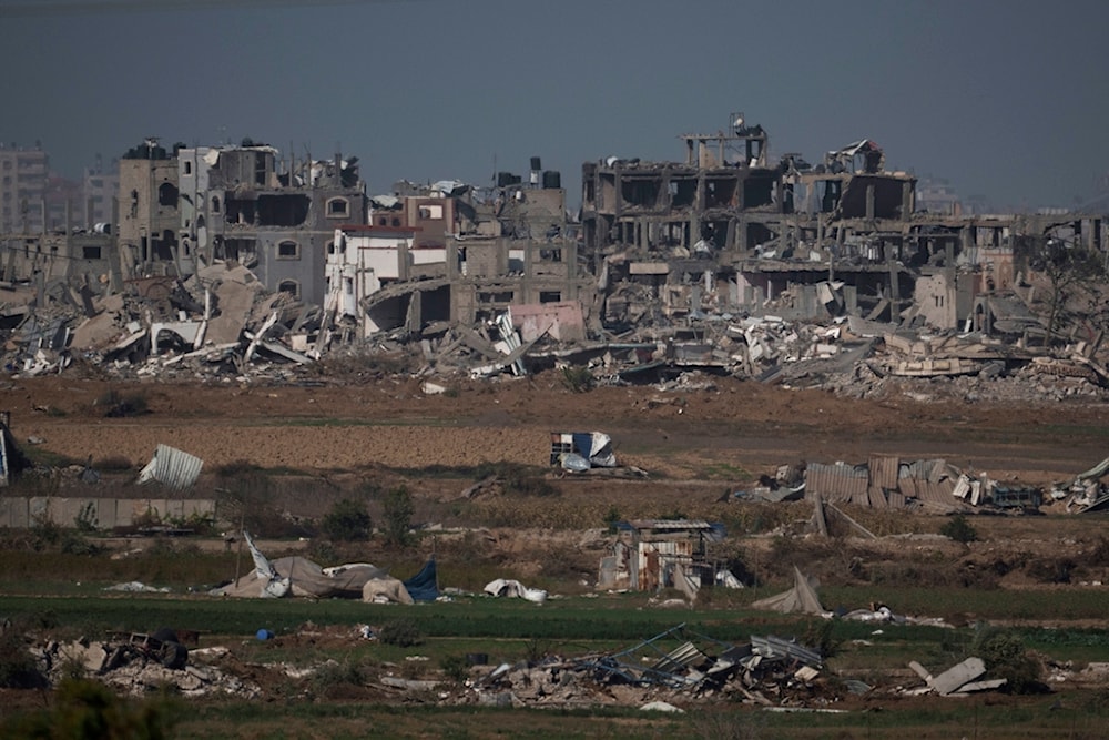Destroyed farms and buildings in the Gaza Strip as seen from occupied Palestine's Gaza Envelope, Friday, Dec. 22, 2023. (AP)