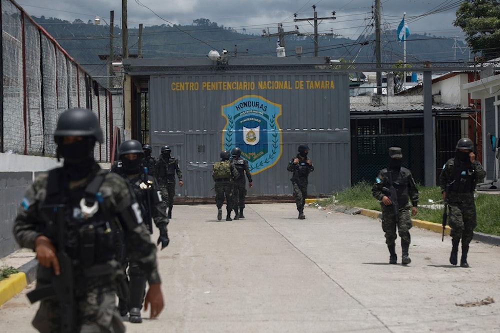 Military police guard the entrance to the National Penitentiary Center in Tamara, on the outskirts of Tegucigalpa, Honduras, Tuesday, June 26, 2023.(AP)
