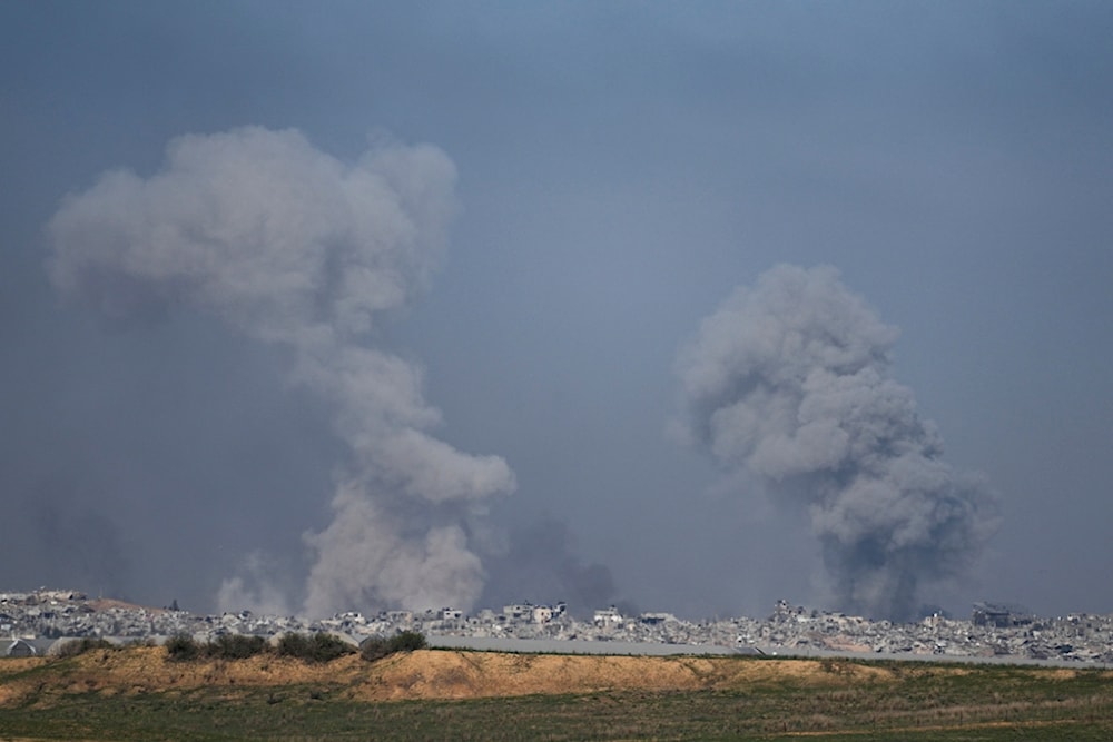 Smoke rises following an Israeli bombardment in the Gaza Strip, as seen from southern occupied Palestine, Wednesday, Dec. 20, 2023 (AP Photo)