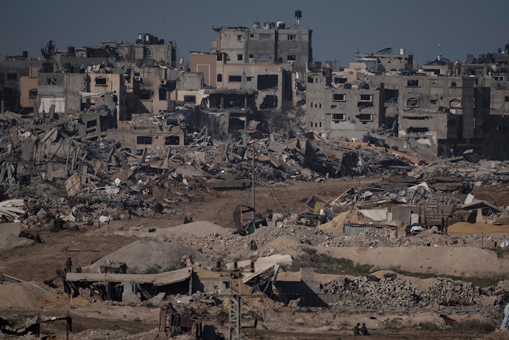 Israeli troops walk in the Gaza Strip on Thursday, Dec. 21, 2023. (AP)