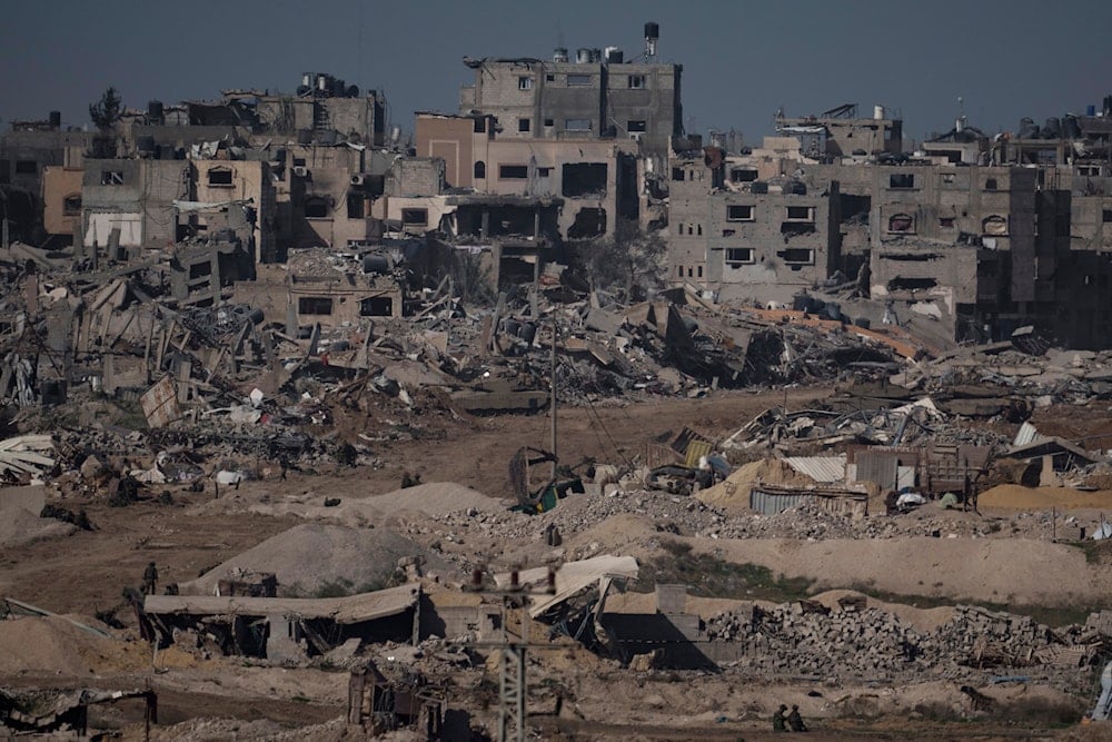 Israeli troops walk in the Gaza Strip on Thursday, Dec. 21, 2023. (AP)