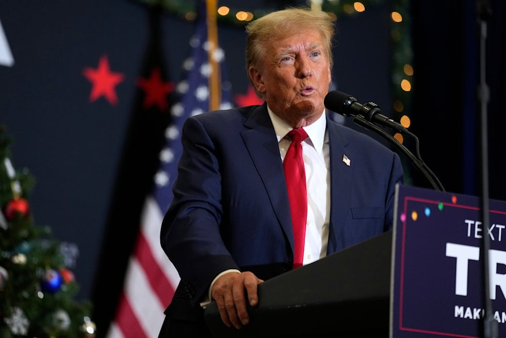 Former President Donald Trump speaks during a commit to caucus rally, Tuesday, Dec. 19, 2023, in Waterloo, Iowa. (AP)