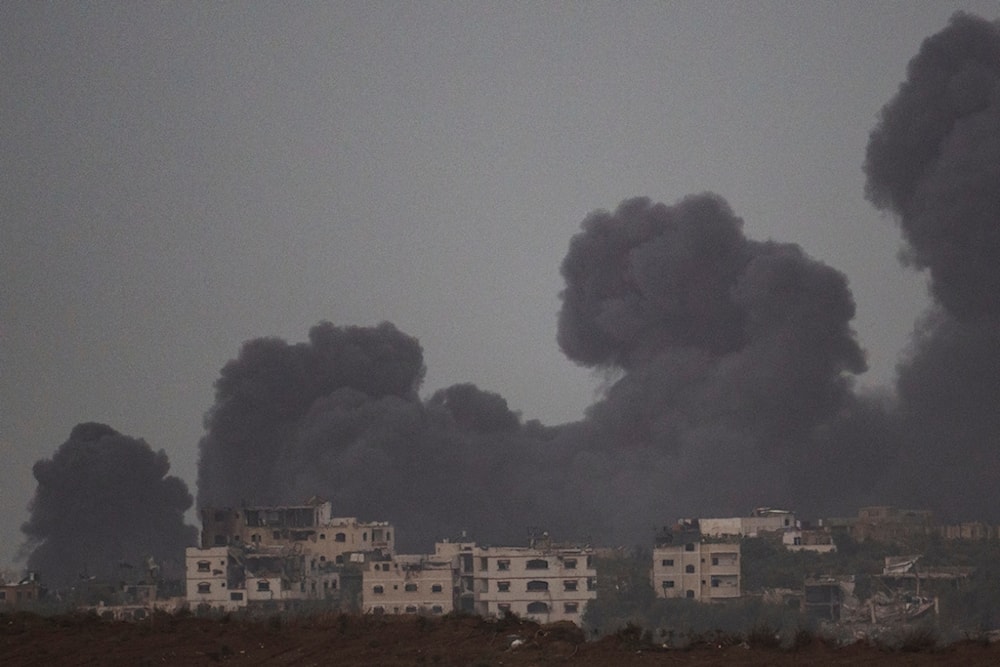 Smoke rises to the sky after an explosion in Gaza Strip as seen from Southern Palestine, Saturday, Dec. 23, 2023. (AP)