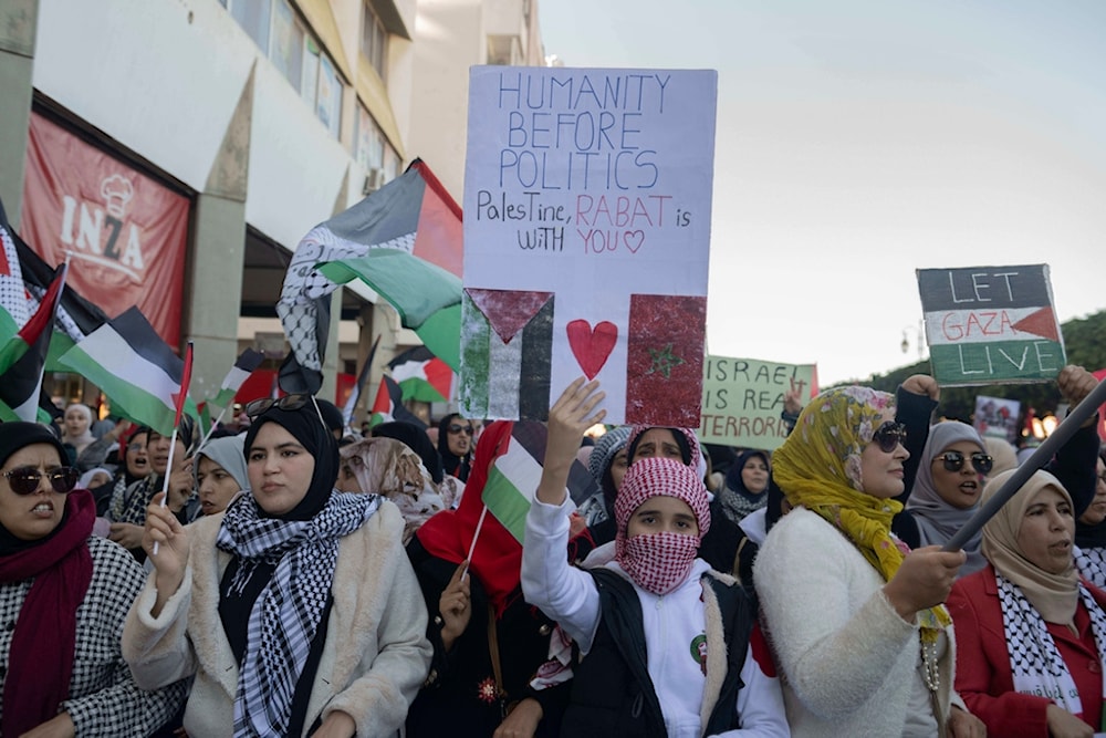 Hundreds of protesters take part in a march in solidarity with Palestinians in Gaza and against their country's normalization deal with Israel, in Rabat, Morocco, Sunday, Dec. 10, 2023. (AP)
