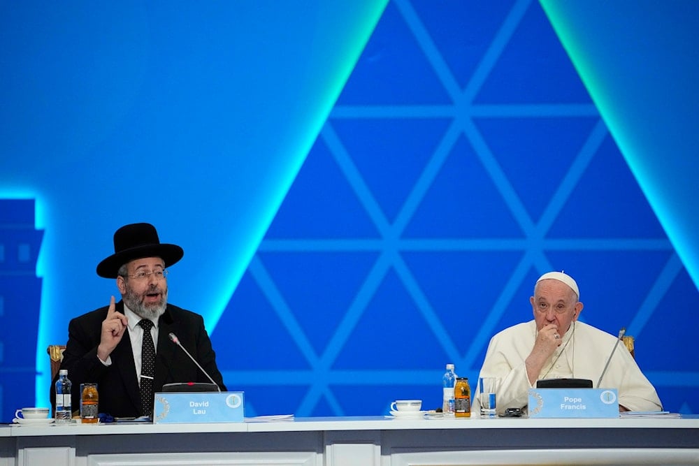 Israeli Ashkenazi Chief Rabbi David Lau delivers his speech flanked by Pope Francis during the '7th Congress of Leaders of World and Traditional Religions', at the Palace of Peace and Reconciliation, in Nur-Sultan, Kazakhstan, September 15, 2022 (AP)