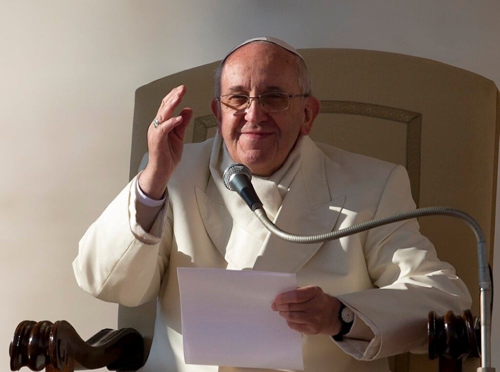 Pope Francis delivers his speech during his weekly general audience in St. Peter's Square at the Vatican, Wednesday, Dec. 11, 2013. (AP)