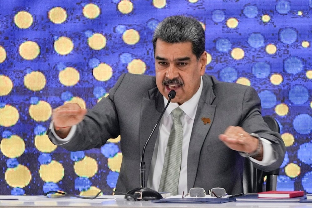 Venezuela's President Nicolas Maduro speaks during the notification ceremony for the referendum about the future of a disputed territory with Guyana, in Caracas, Venezuela, Dec. 4, 2023 (AP Photo/Ariana Cubillos)