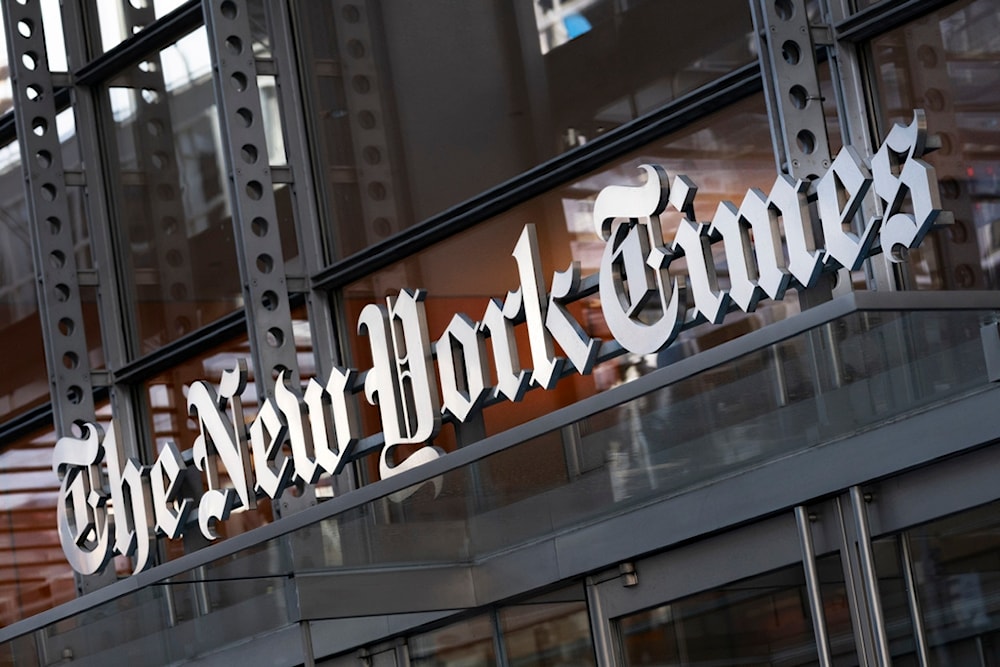 A sign for The New York Times hangs above the entrance to its building, Thursday, May 6, 2021 in New York. (AP)