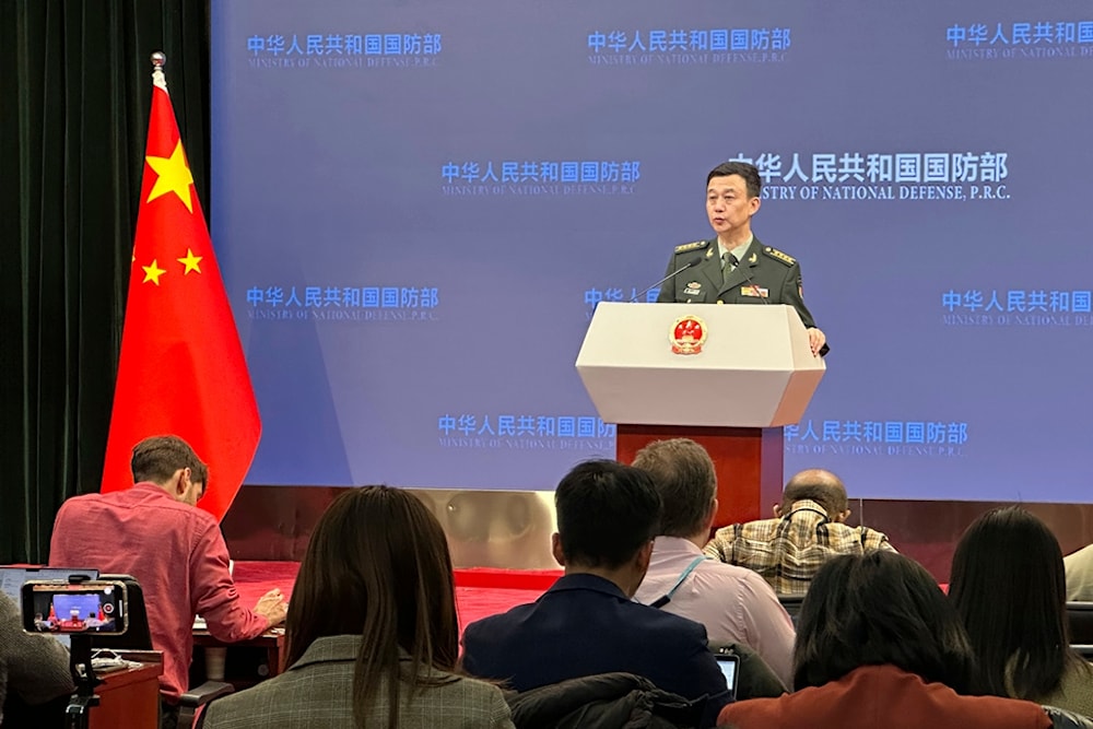 China's Defense Ministry spokesperson Col. Wu Qian speaks to reporters at a monthly briefing in Beijing, Thursday, Dec. 28, 2023. (AP)