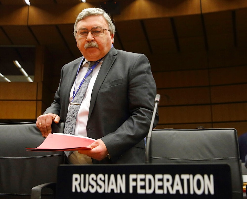 Russian Permanent Representative to the IAEA Mikhail Ulyanov arrives for an IAEA Board of Governors meeting in Vienna, Austria, February 6, 2023 (AP)