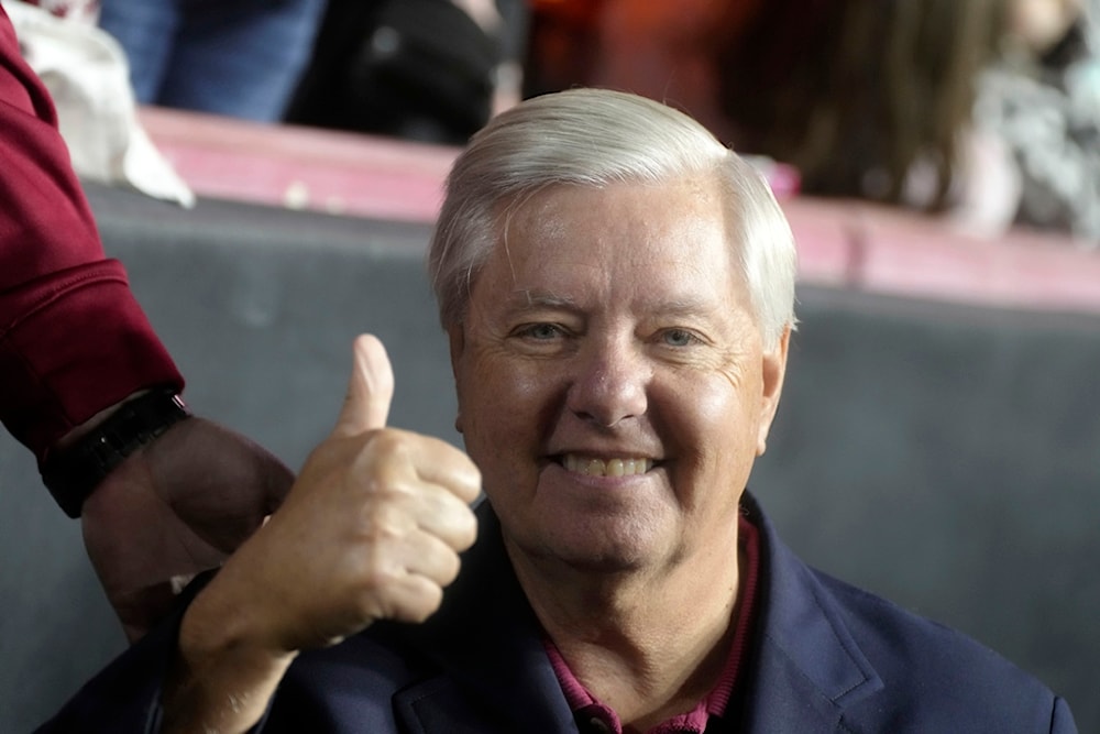 Sen. Lindsey Graham gives a thumbs up on the sidelines of the annual football match between the University of South Carolina and Clemson University on Saturday, Nov. 25, 2023 (AP)