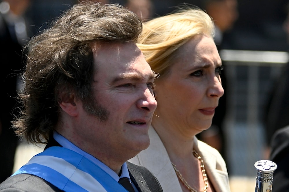 Argentina's newly sworn-in President Javier Milei, left, and his sister Karina arrive to the government house in Buenos Aires, Argentina, Sunday, Dec. 10, 2023. (AP)