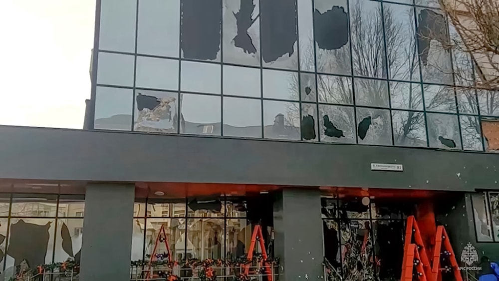In this photo taken from video released by Russia Emergency Situations Ministry telegram channel on Saturday, Dec. 30, 2023, a building damaged after shelling is seen in Belgorod, Russia. (AP)