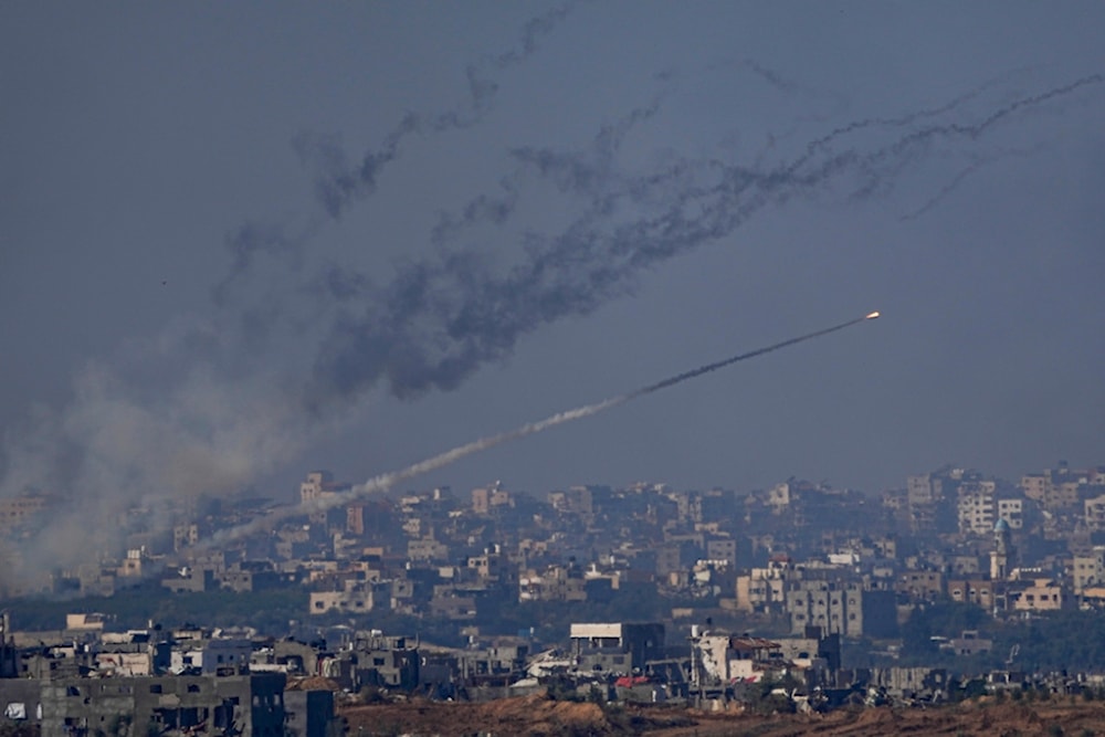 Rockets are fired toward regime-occupied territories from the Gaza Strip, Friday, Dec. 1, 2023. (AP Photo/Ariel Schalit)