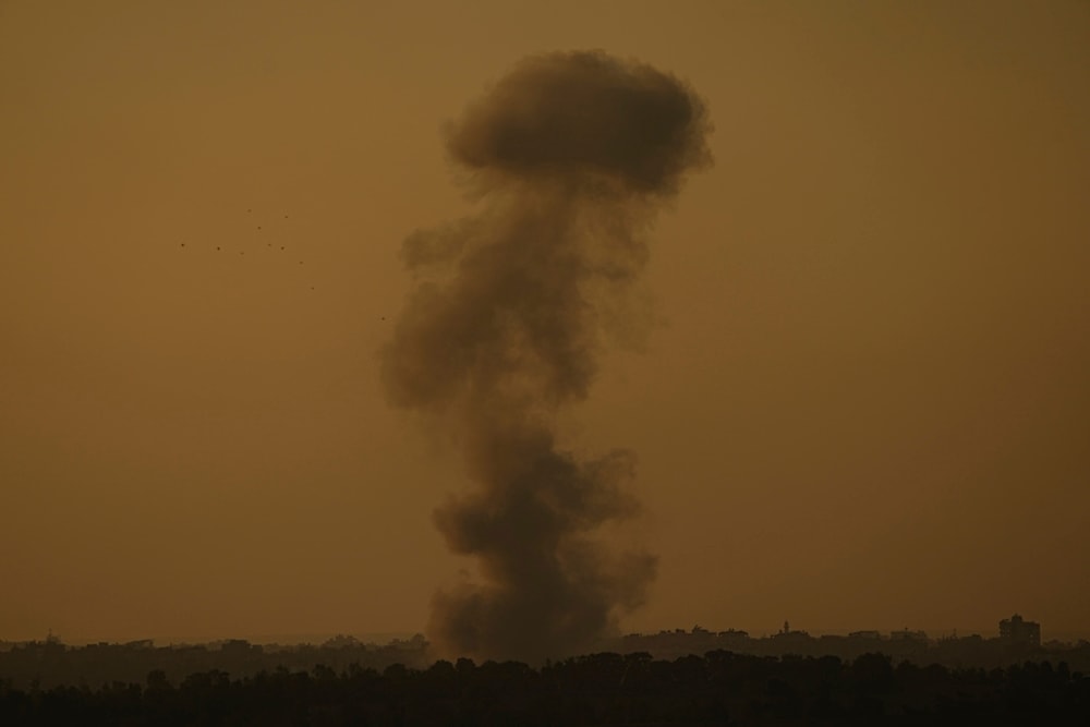 Smoke rises following an Israeli bombardment in the Gaza Strip, as seen from southern occupied Palestine, Wednesday, Dec. 6, 2023. (AP Photo/Ariel Schalit)